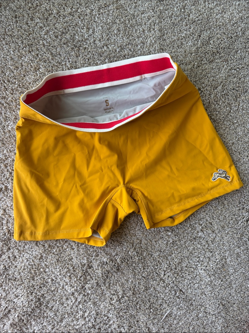 Tracksmith Golden Yellow Bike Shorts with Red & Cream Waistband